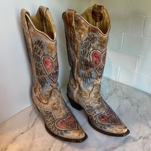 Distressed leather tan boots with heart peace signs
